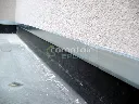 Profilé de finition aluminium - finition en about de mur sur toiture EPDM