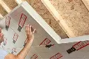 installation-panneaux-isolants-iko-enertherm-toiture-chantier.jpg.webp